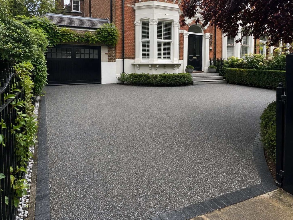 Dark Grey resin bound driveway on grand Victorian red brick London property by Windsor Resin Driveways