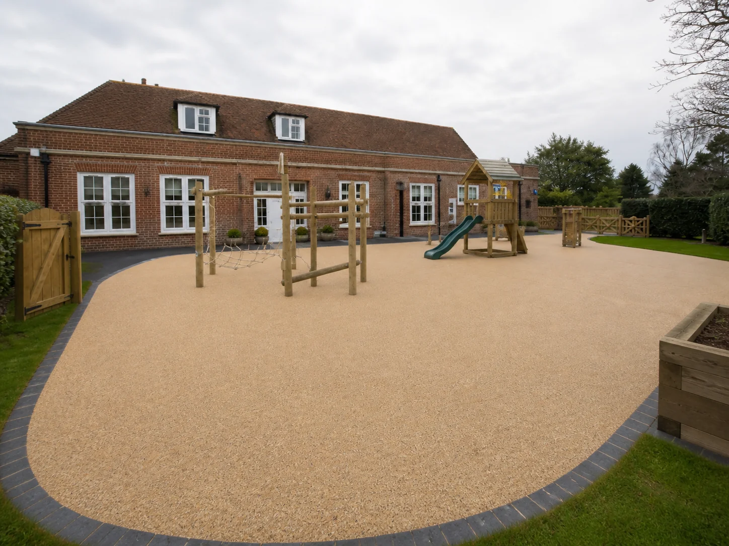 Resin bound play area surface